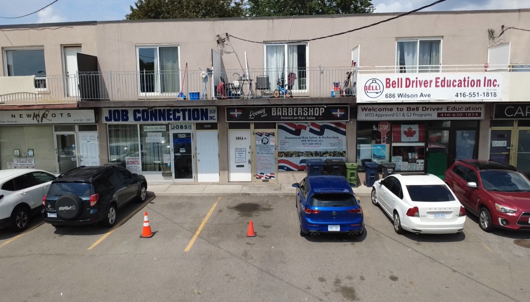 Street view of Looney Tunes Barbershop on Wilson Avenue
